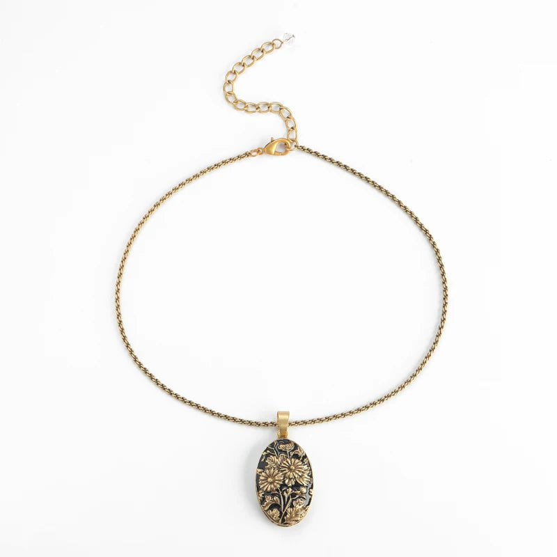 SunGoth™ - Vintage Sunflower Necklace | Black Relief Gothic Jewelry with Antique Gold Finish