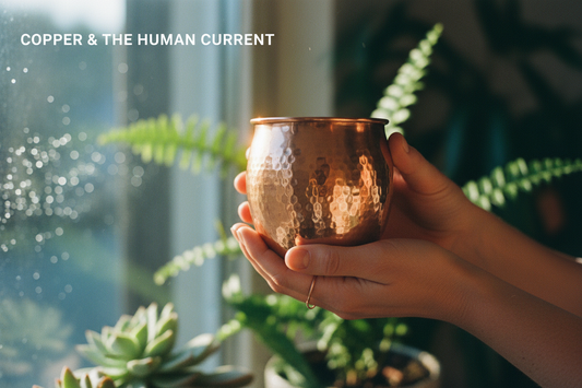 Hands holding pure copper vessel with warm natural light - Human connection with copper - Gaia Waves